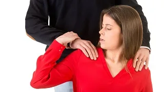 Woman reacting to unwanted contact from a colleague